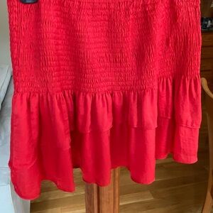 Cute red mini skirt. Size S. Never worn.